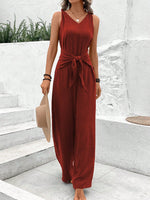 Salopette blu navy con scollo a V e cinturino intrecciato per donne