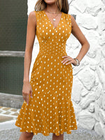 Abiti con stampa a punti dorati con volant