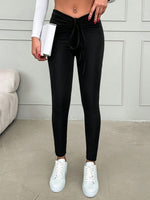 Pantaloni aderente con coulisse frontale