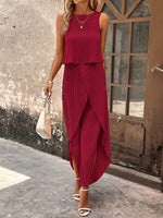 Top di stile vacanziero elegante stampato a pois per signore con pantaloni a gamba larga con spacco avanti