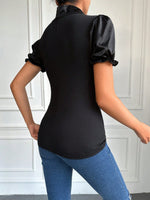 Top con cravatta al collo con manica a sbuffo