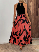 Abito estivo senza maniche con collo rotondo, stampa grafica e fori decorativi