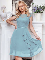 Abito cocktail svasato pizzo floreale corpetto con bordo a volant festa