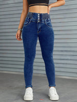 Jeans skinny vita alta con bottone