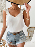 Elegante Top Con Maniche A Cappuccio E Spacco In Pizzo