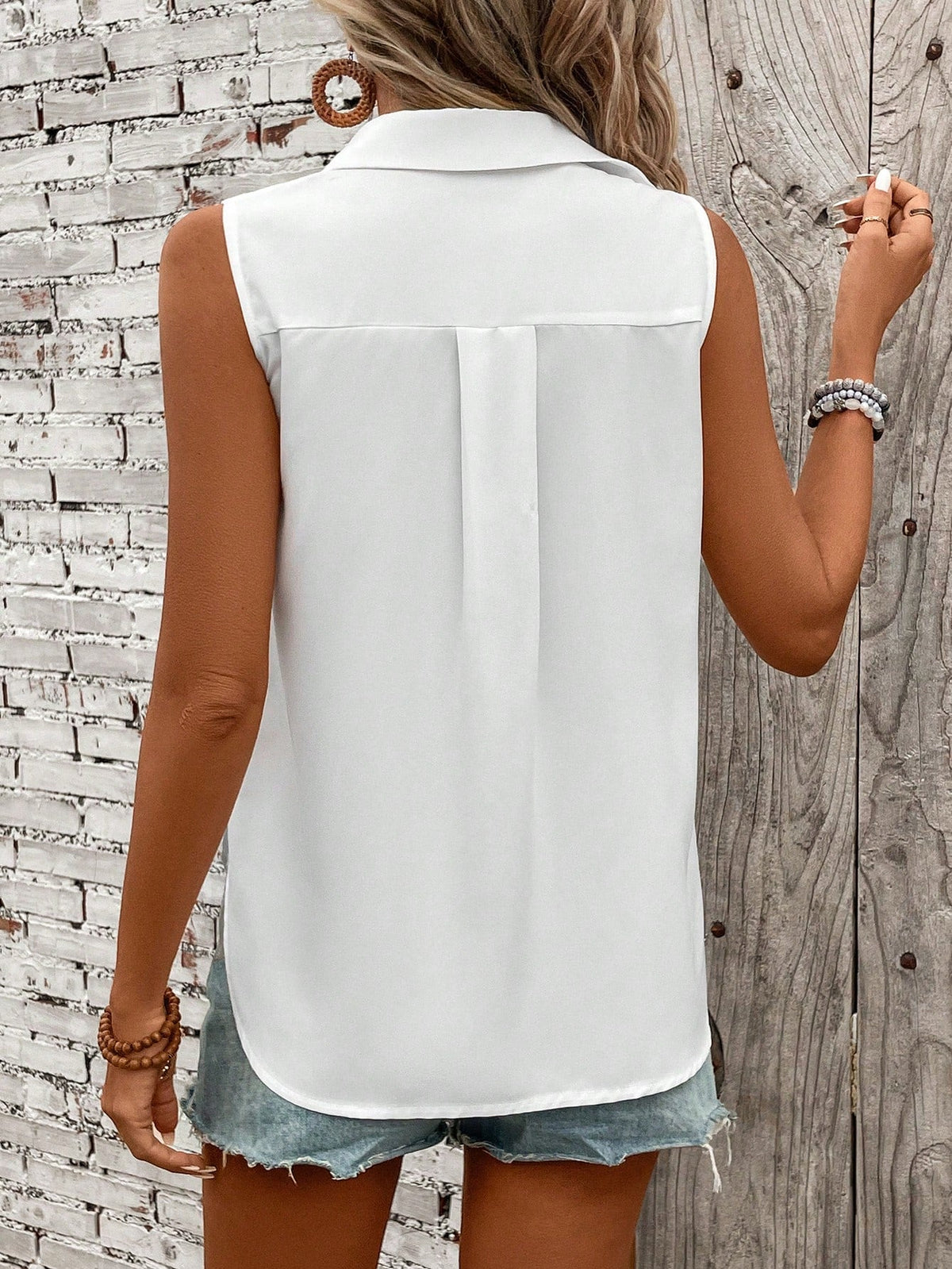 Camicia senza maniche con bottoni frontali, perfetta per vacanze e tempo libero, colore tinta unita