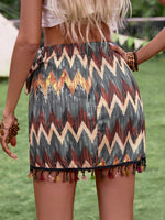 Gonna di stile bohemien con decorazione a nappina