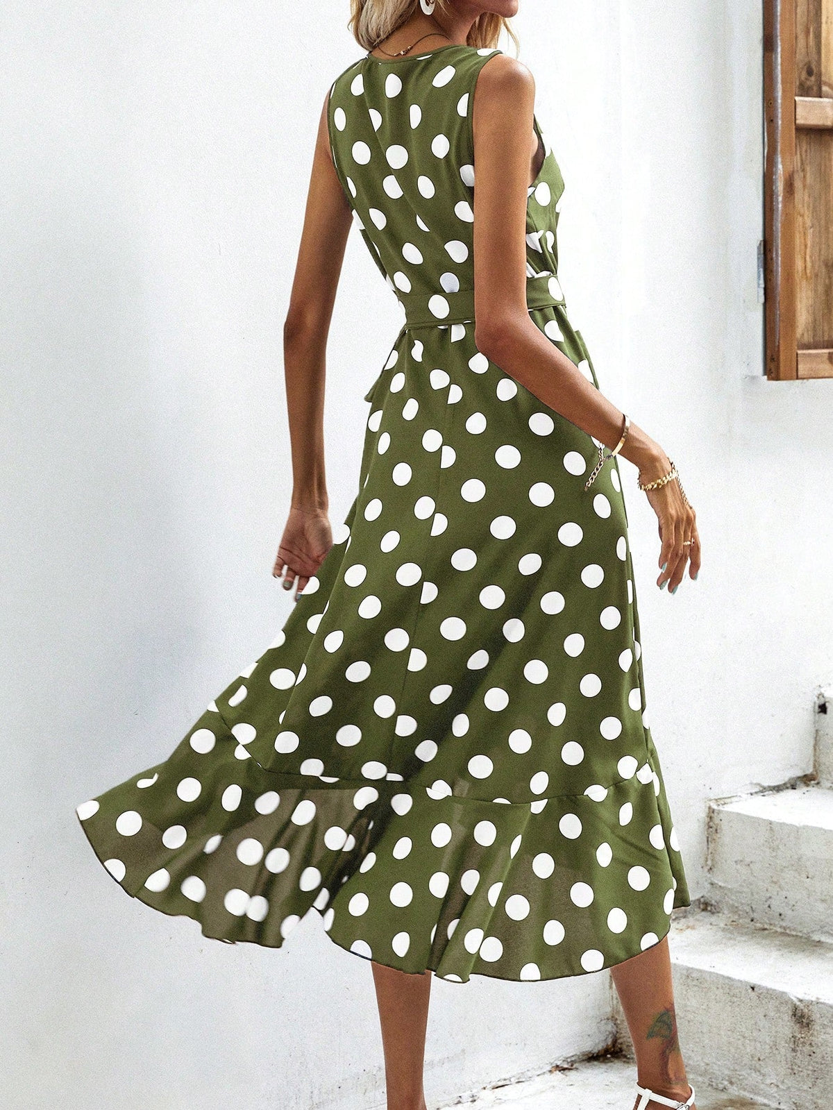 ABito incrociato a pois con nodo laterale