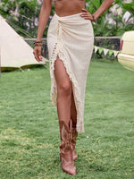 Gonna irregolare da donna con orlo sfrangiato e twist in colore tinta unita