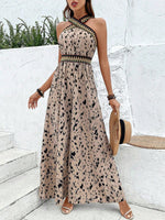 Jumpsuit stampato all over incrociato con schiena scoperta