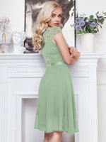 Abito cocktail svasato pizzo floreale corpetto con bordo a volant festa