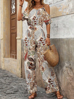 Tuta jumpsuit con spalline sottili, morbida vestibilitˆ, maniche a goccia e stampa all-over