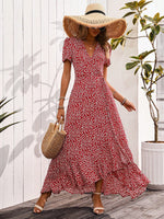 Abito incrociato con nodo con margherita