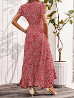 Abito incrociato con nodo con margherita