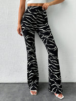 Pantaloni svasati con stampa leopardo