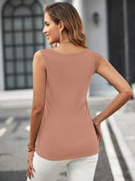 Canotta monocolore orlo asimmetrico