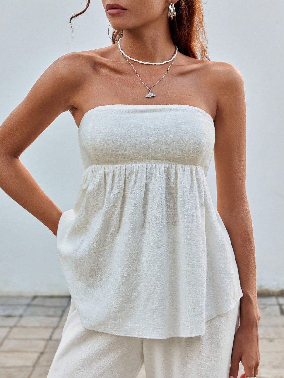 Top a maglia senza maniche a fascia per donne con stampa leopardata