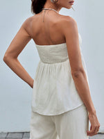 Top a maglia senza maniche a fascia per donne con stampa leopardata