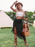 Gonna irregolare da donna con orlo sfrangiato e twist in colore tinta unita