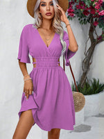 Abiti con cut out sulla vita manica a farfalla