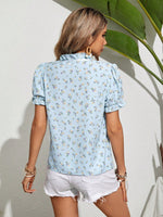 Camicetta con stampa floreale con cravatta al collo con manica a sbuffo