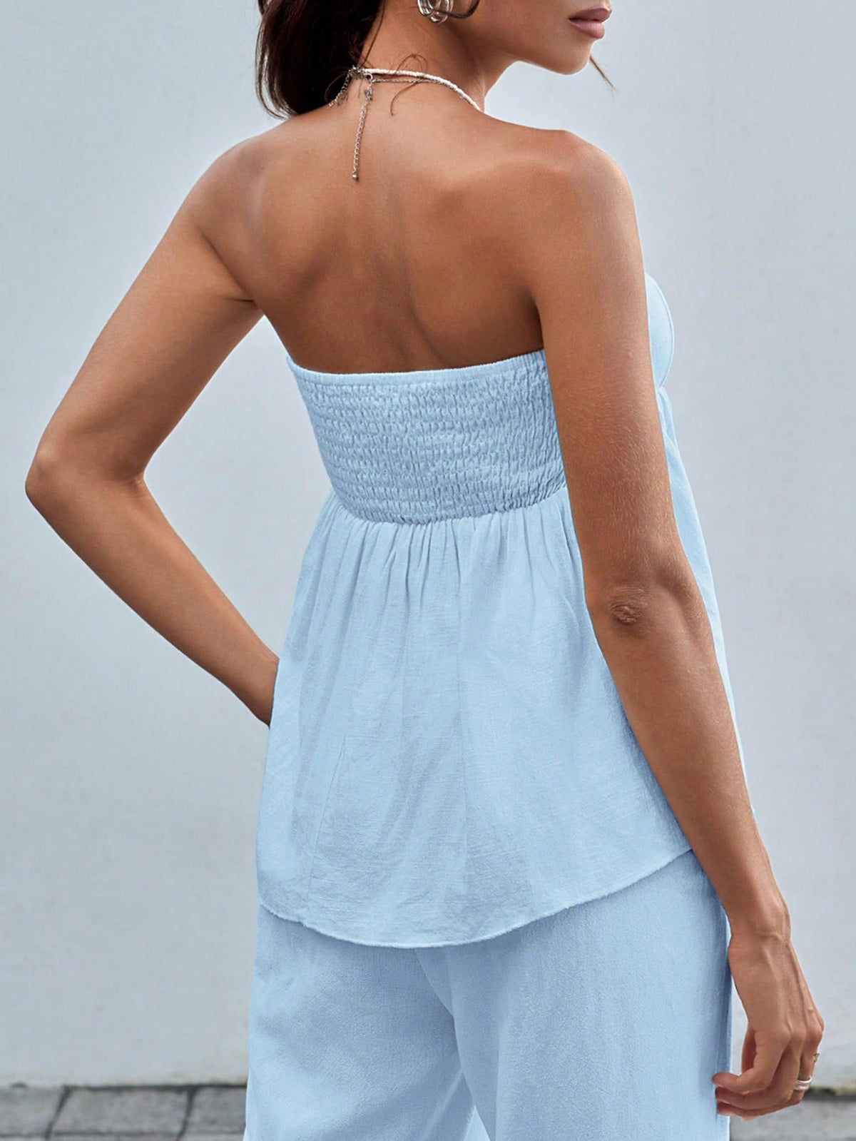 Top a maglia senza maniche a fascia per donne con stampa leopardata