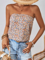 Top tubo con stampa geo e slogan