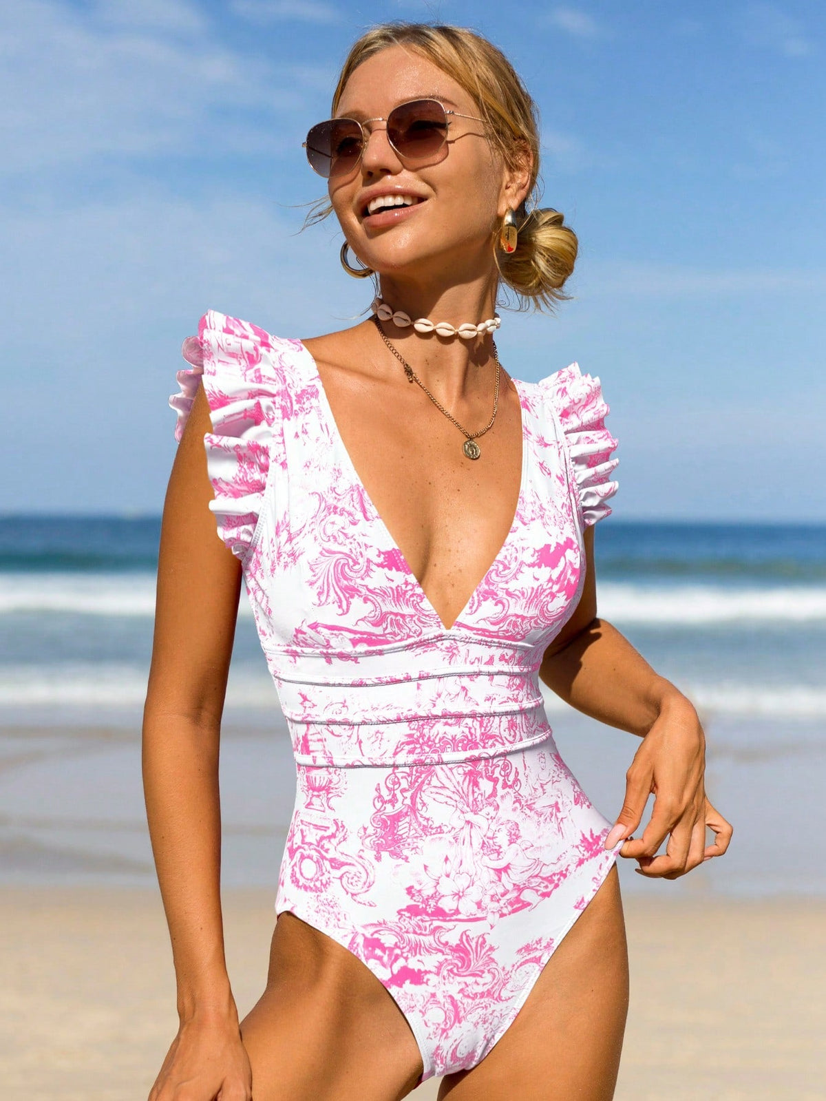 Costume intero monocolore con bordo a volant con collo a V profondo con schiena scoperta