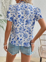 Camicetta con stampa floreale con cravatta al collo con manica a sbuffo