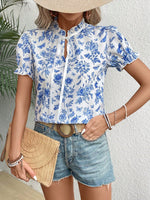 Camicetta con stampa floreale con cravatta al collo con manica a sbuffo