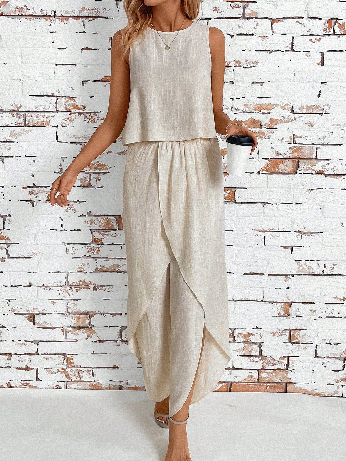 Top di stile vacanziero elegante stampato a pois per signore con pantaloni a gamba larga con spacco avanti