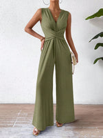 Tuta femminile senza maniche con vita incrociata elegante