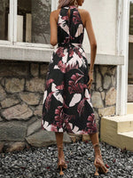 Abito estivo casuale con scollo a Halter e stampa tropicale per le vacanze