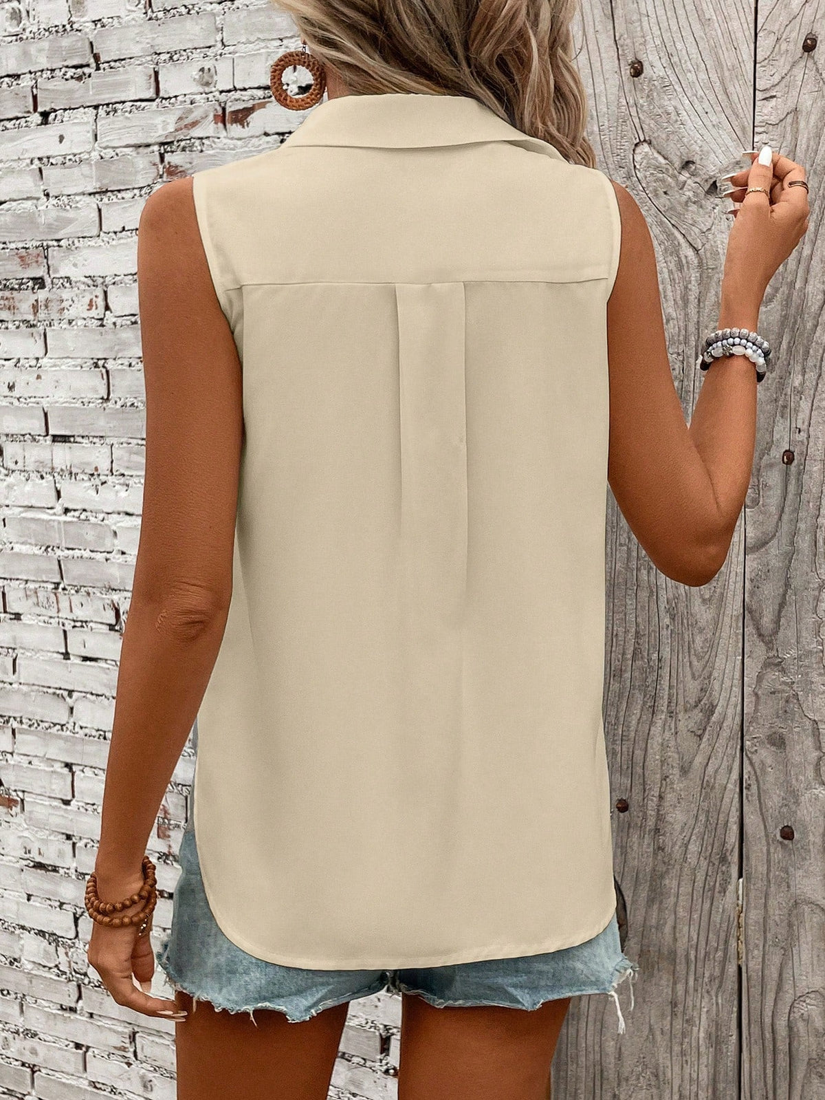 Camicia senza maniche con bottoni frontali, perfetta per vacanze e tempo libero, colore tinta unita