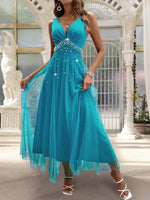 Abito con sovrapposizione a maglia di perline di perle