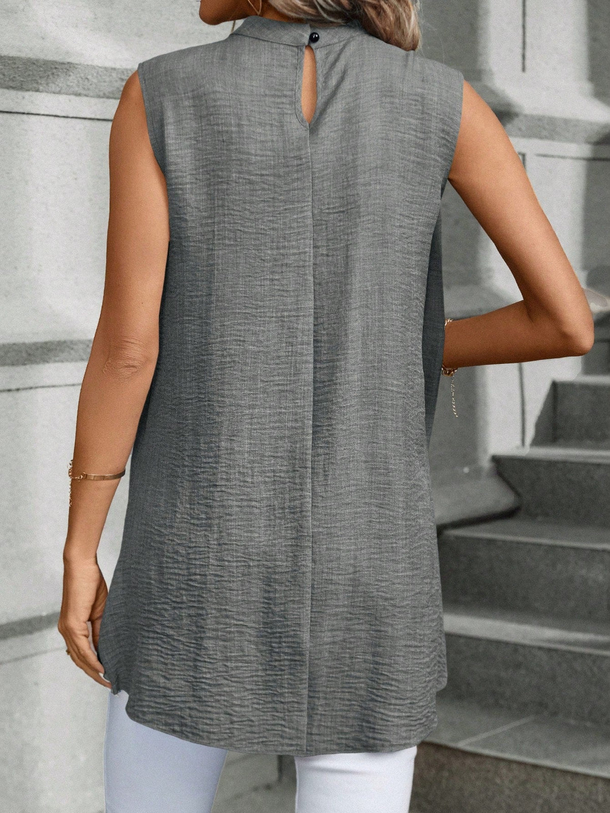 Blusa Da Donna Senza Maniche Con Colletto Alto E Orlo Asimmetrico