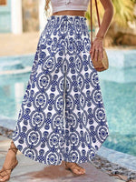 Pantaloni stampati a gamba larga, a vita alta e a svasati per donne in vacanza con orlo a balze