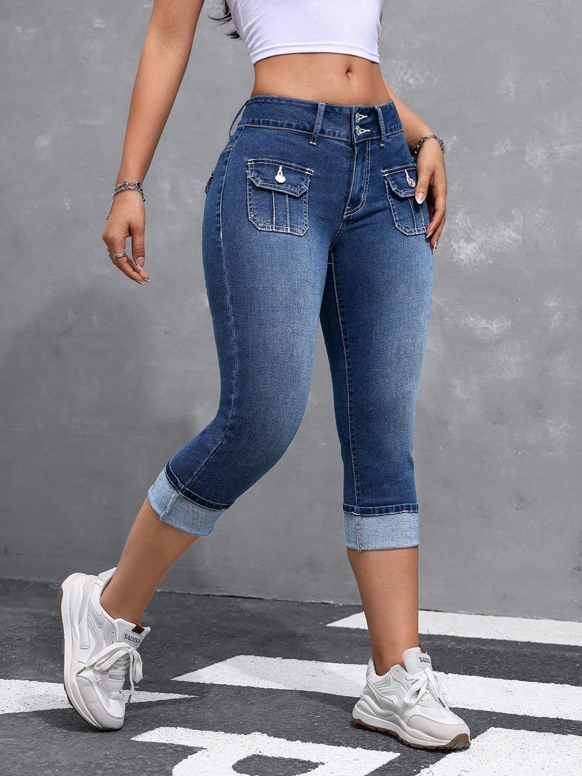 Pantaloni in denim casual a sette punte con orlo ripiegato e tasche, da donna