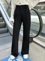 Pantaloni a zampa alta vita alta di colore unito da donna