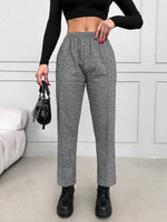 Pantaloni con elastico in vita e tasche inclinate