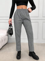 Pantaloni con elastico in vita e tasche inclinate