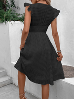 Abito trapezio monocolore con bordo a volant