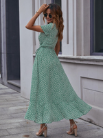 Abito incrociato con nodo con margherita