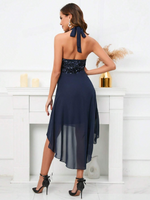 Abito halter paillette a contrasto orlo asimmetrico