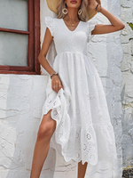 Abiti ricamo ad occhielli con bordo a volant