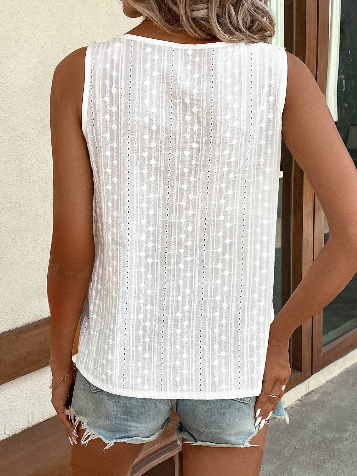 Camicetta senza maniche con pois pannello in pizzo guipure