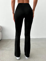 Pantaloni dritti dettaglio bottone