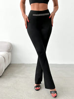 Pantaloni svasati orlo a fessura