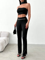 Pantaloni svasati orlo a fessura