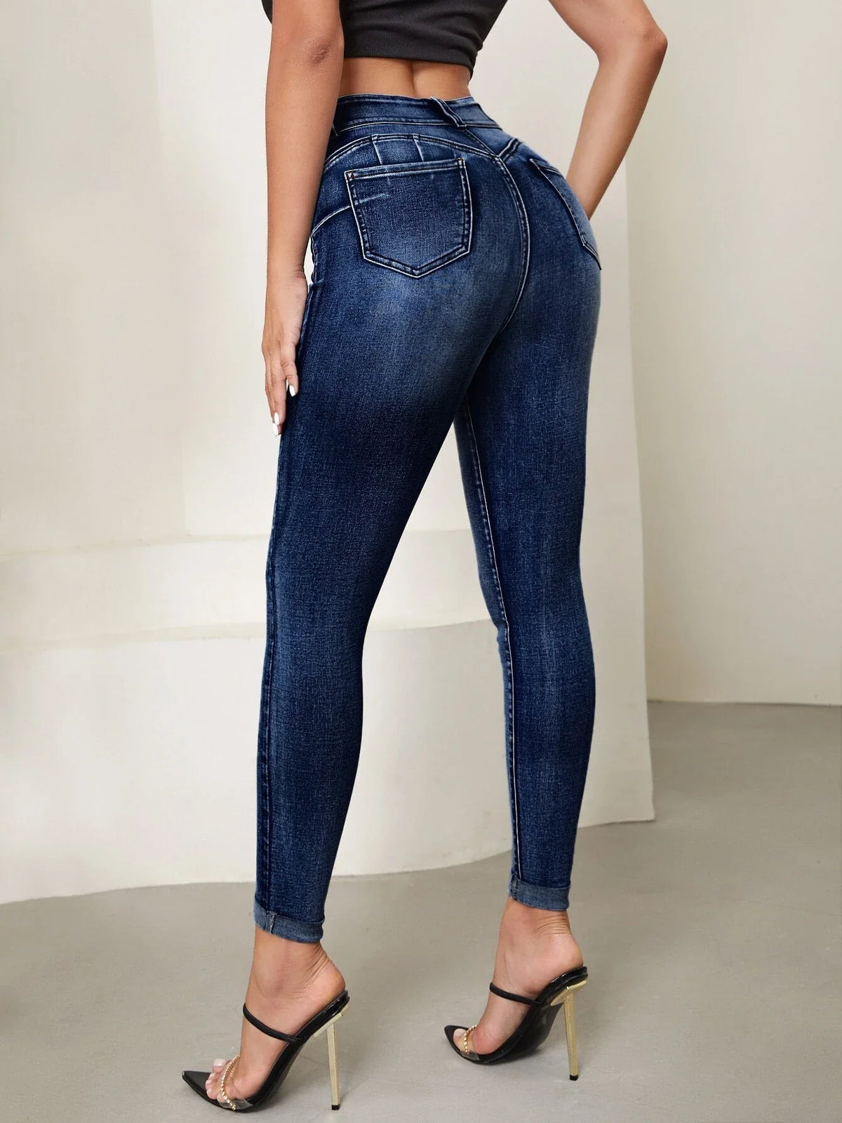 Jeans skinny vita alta lavaggio con candeggina